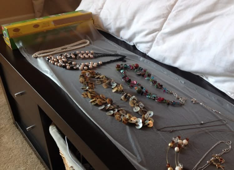Store necklace with plastic wrap Store necklace with plastic wrap