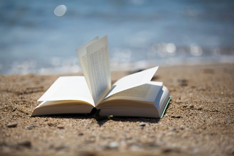 Paperback book on the beach