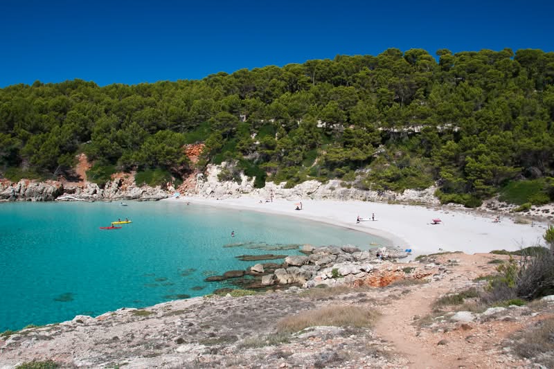 spain-balearic-islands-menorca-minorca-cala-escorxada-beach-gettyimages-138409898.jpg
