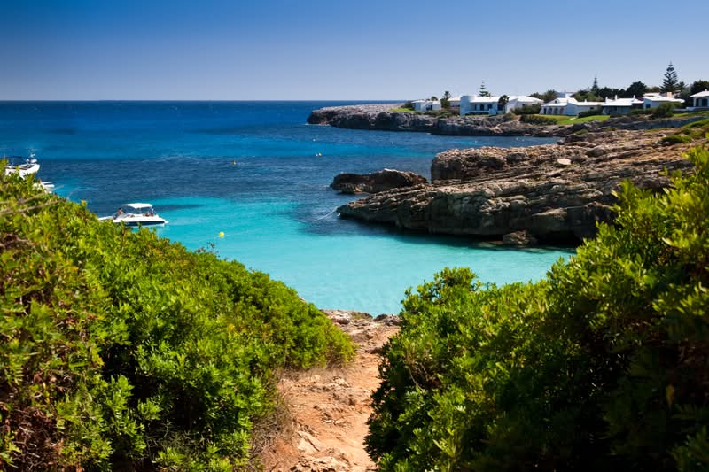spain-balearic-islands-menorca-minorca-es-calo-blanc-beach-gettyimages-498434113.jpg
