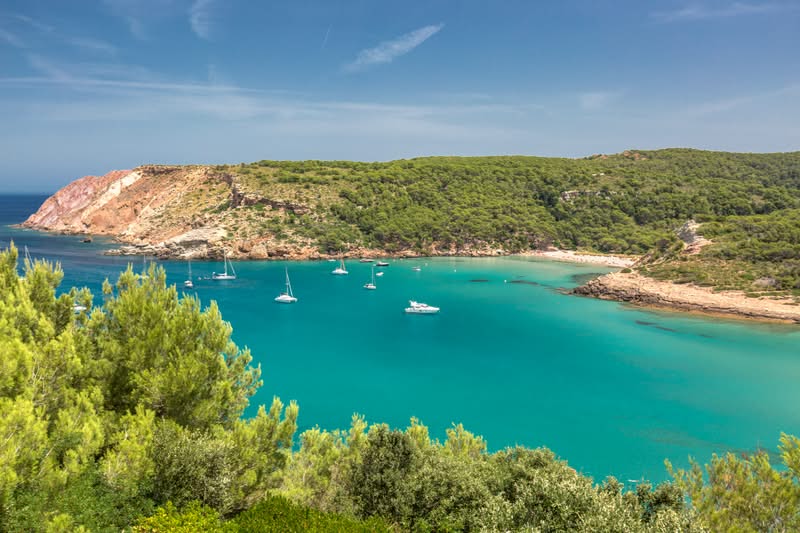 spain-balearic-islands-menorca-minorca-algaraiens-beach-la-vall-gettyimages-585833021.jpg