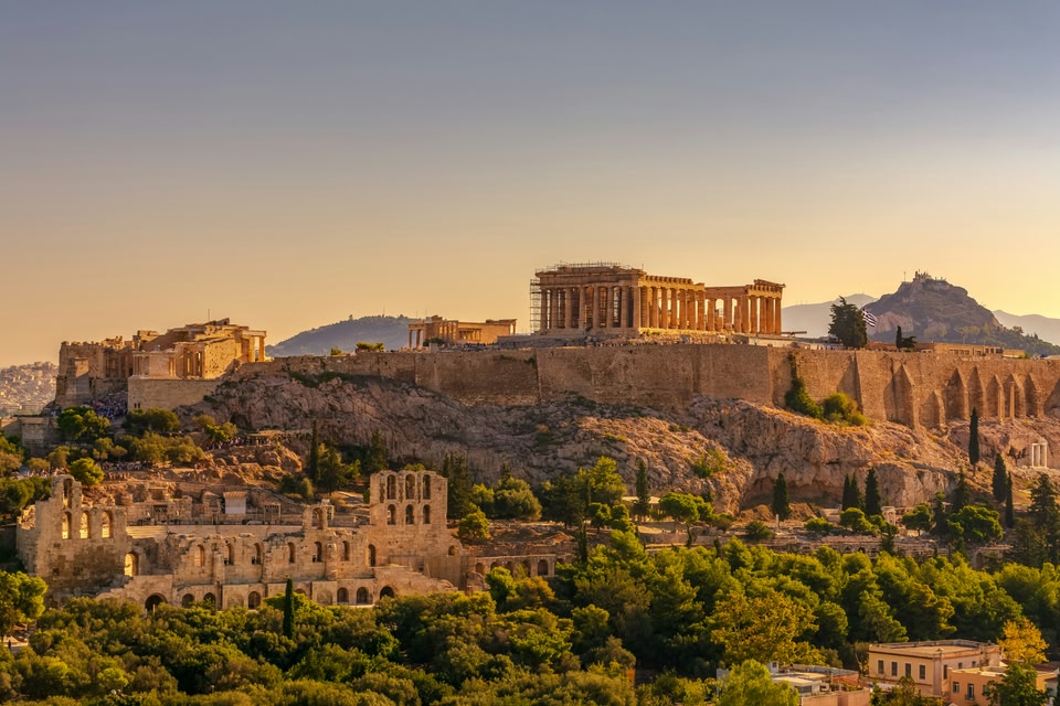A photo of Athens at sunset with a view of the acropolis
