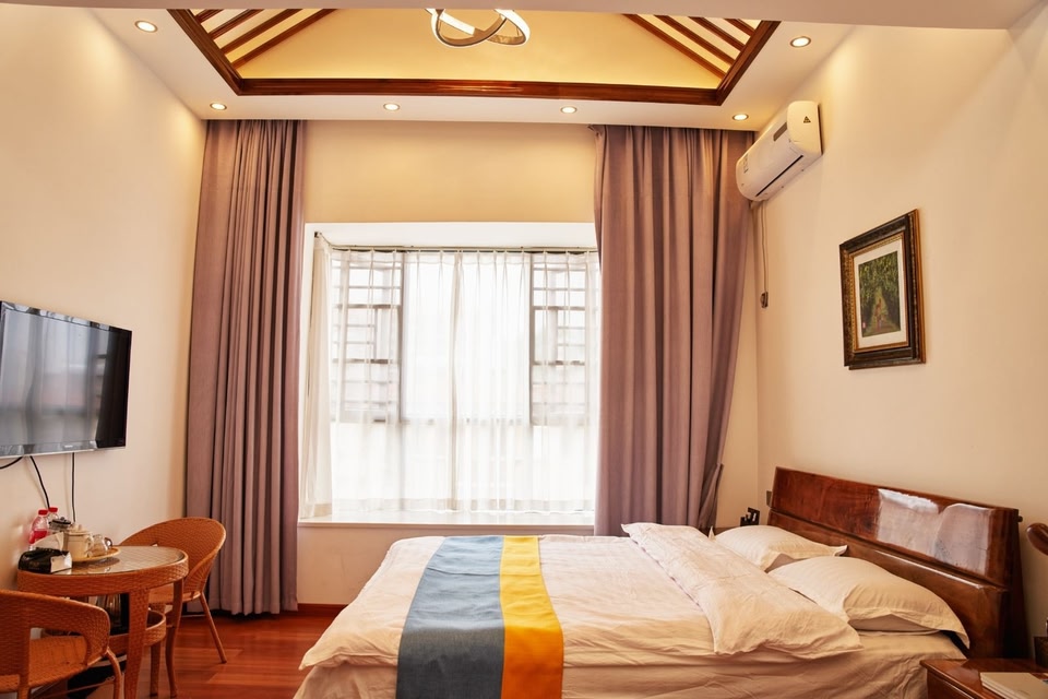 Mangshi Minsu Hotel
