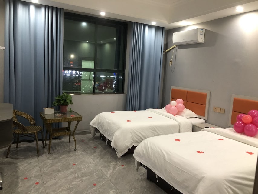 Wanzai Xinshi Hotel