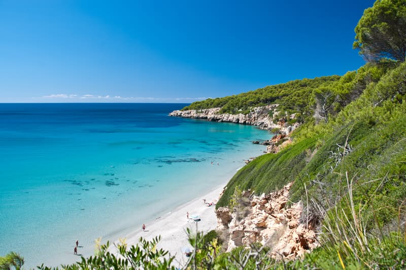 spain-balearic-islands-menorca-minorca-binigaus-beach-gettyimages-138409899.jpg