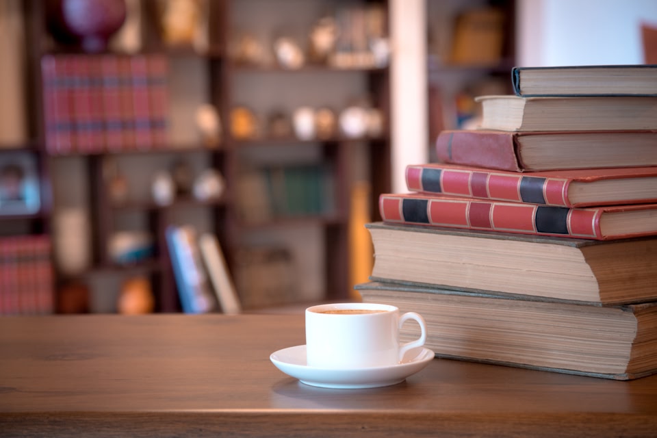 coffee and books on a table