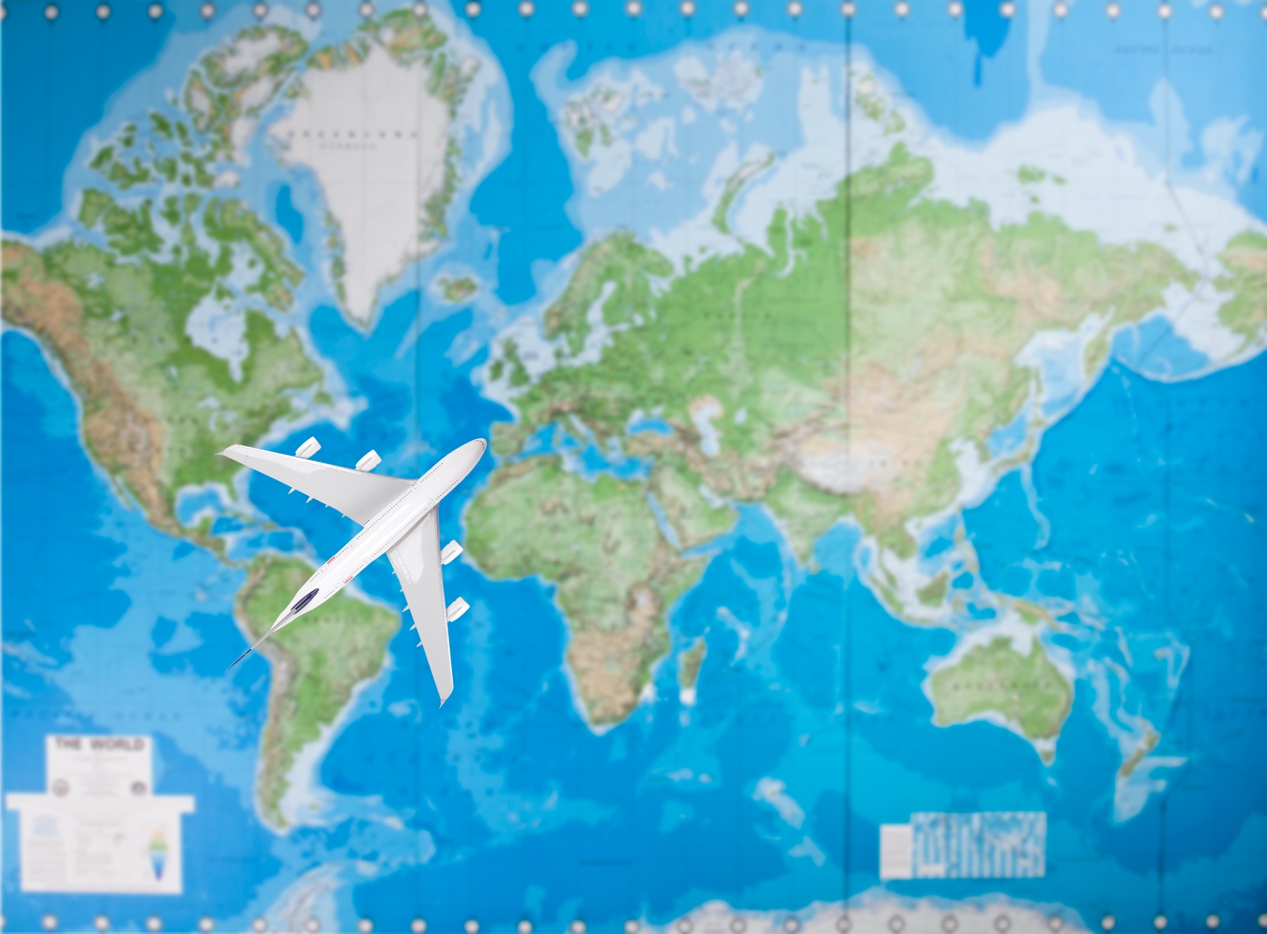 world map and plane