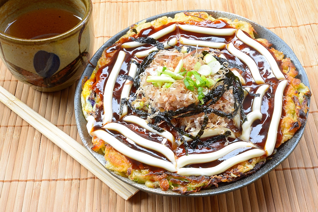 Okonomiyaki in Osaka, Japan - destinations for a celebration