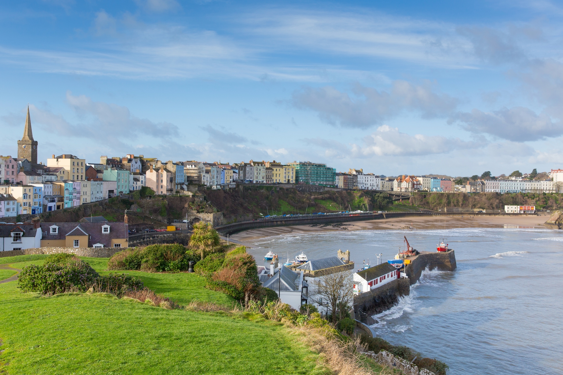 The pastel houses of Tenby in Wales, one of the stopping points along the coastal way scenic route.
