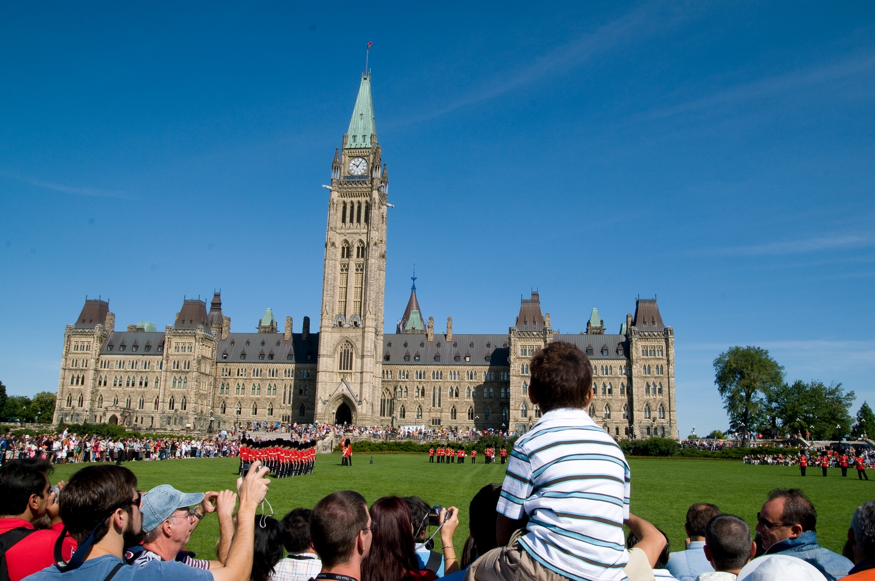 Crowds and the RCMP at Ottawa's Parliament Hill for Canada Day