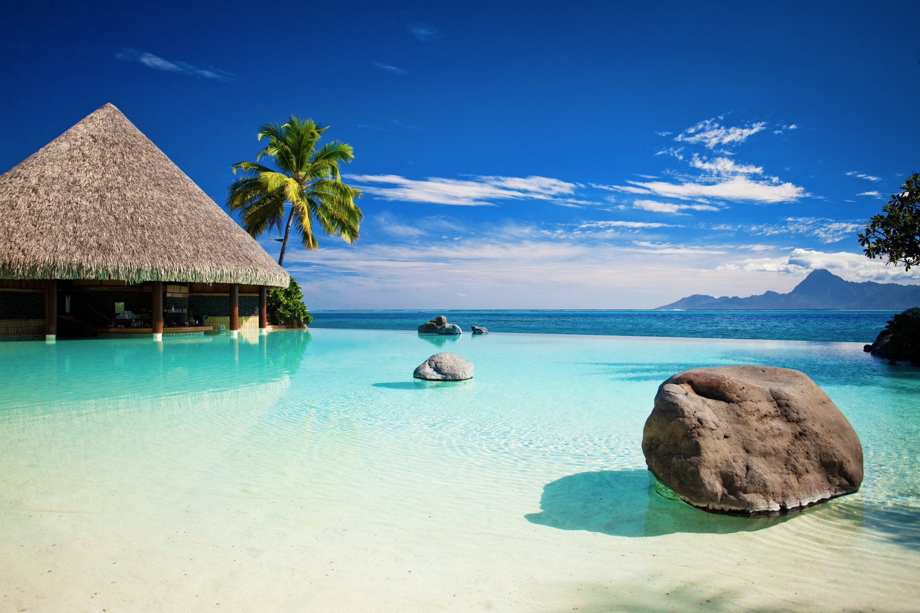 floating restaurant and turquoise waters in tahiti french polynesia