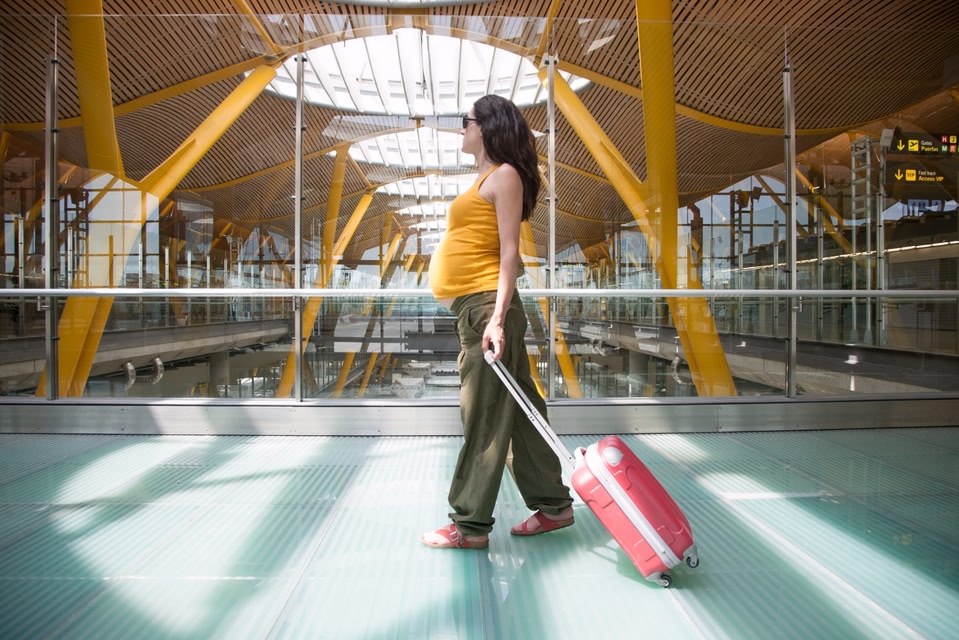 Pregnant Woman in Airport