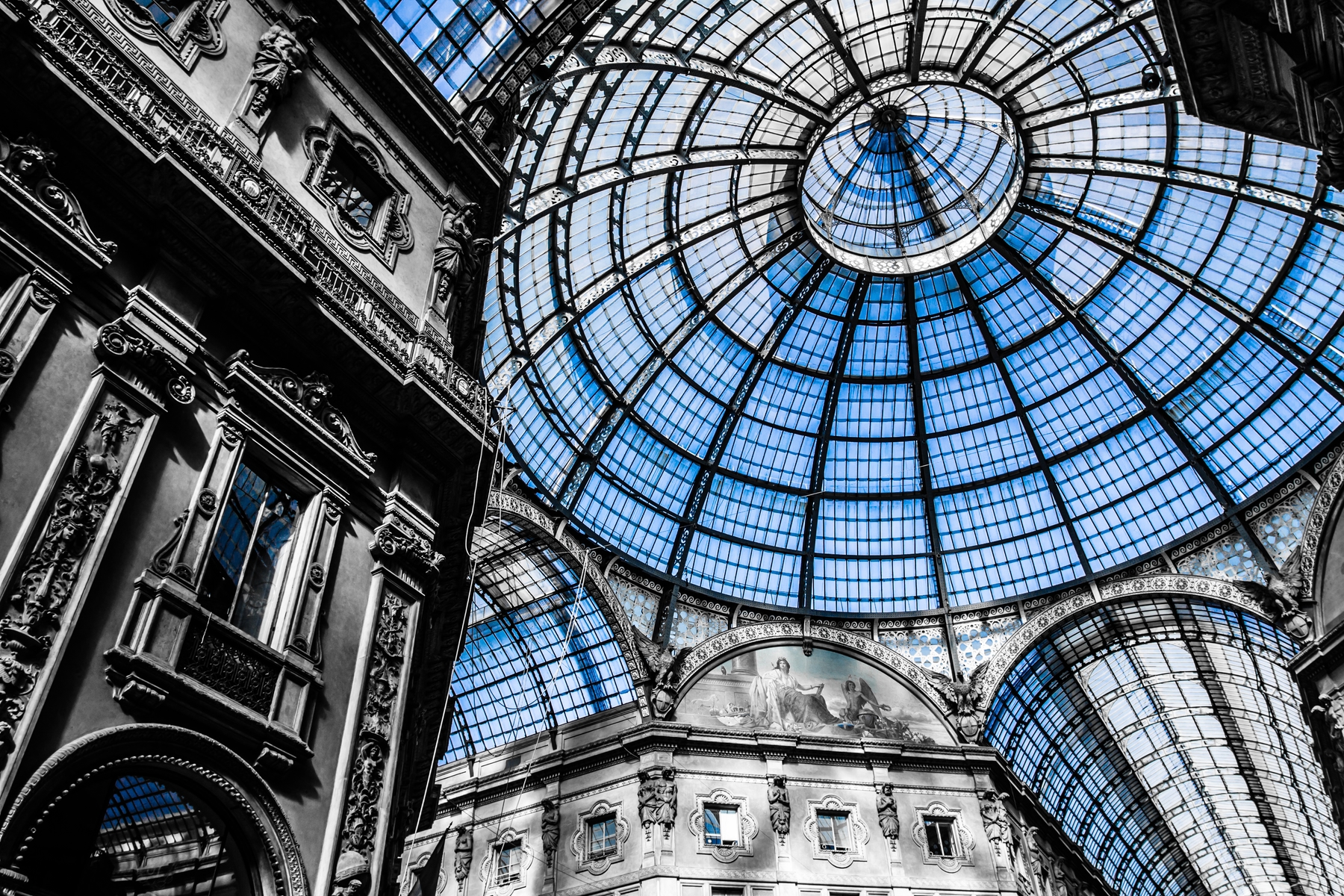 view of dome from below inside Milan Cathedral