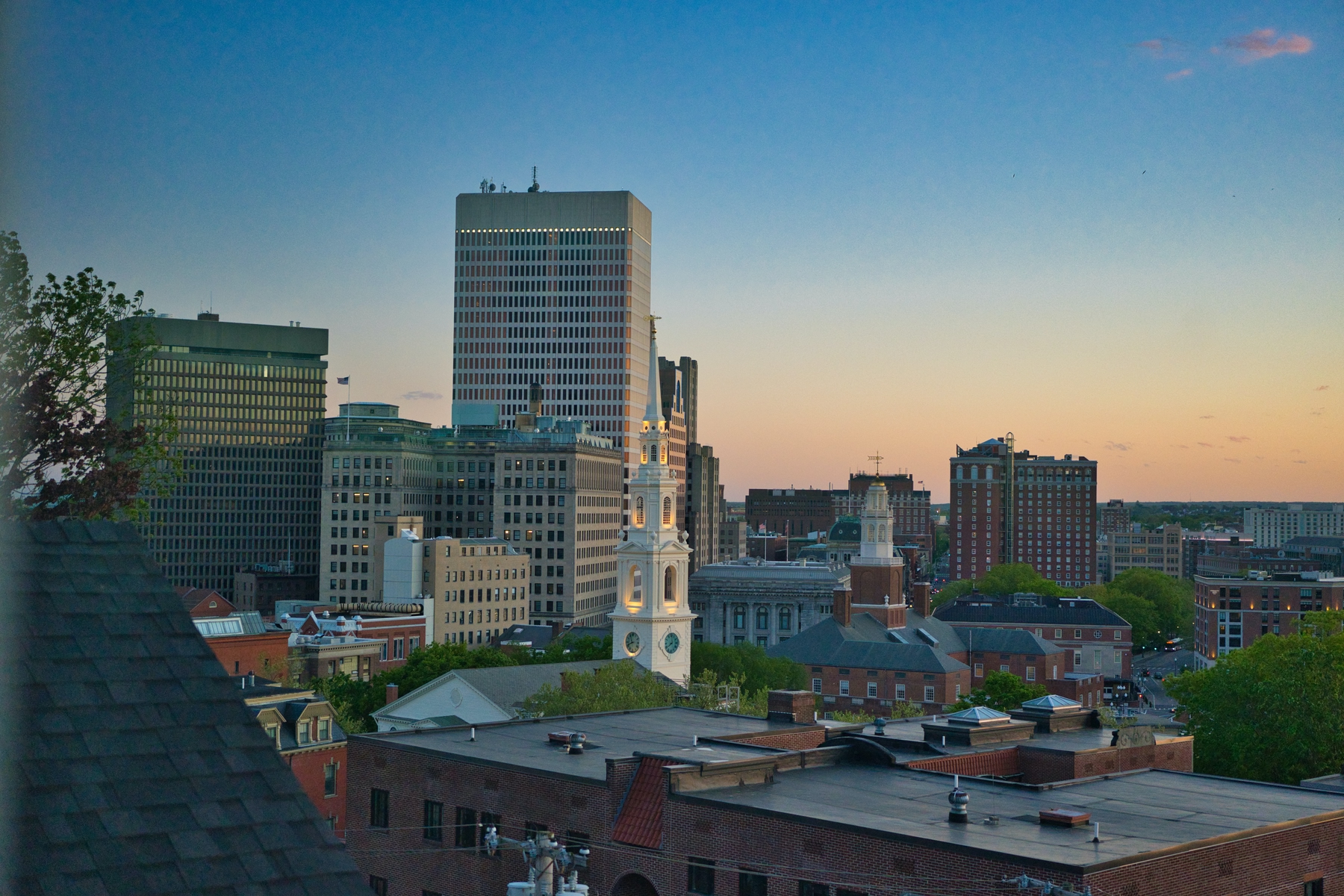 Skyline of downtown Providence, Rhode Island, street art over the bridge. sunny day and blue skies.