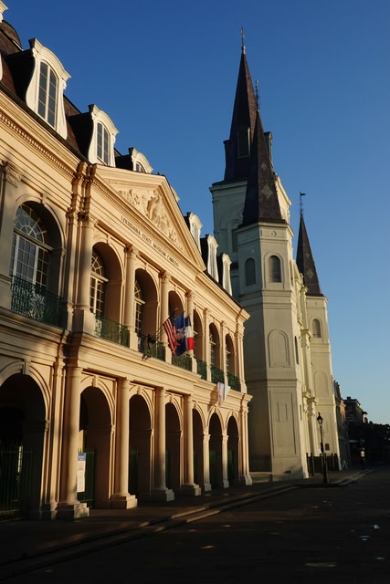 New Orleans, LA / USA - March 31, 2020: Historic Jackson Square is home to many New Orleans icons including Saint Louis Cathedral, the Andrew Jackson statue, shops, restaurants and street artists.