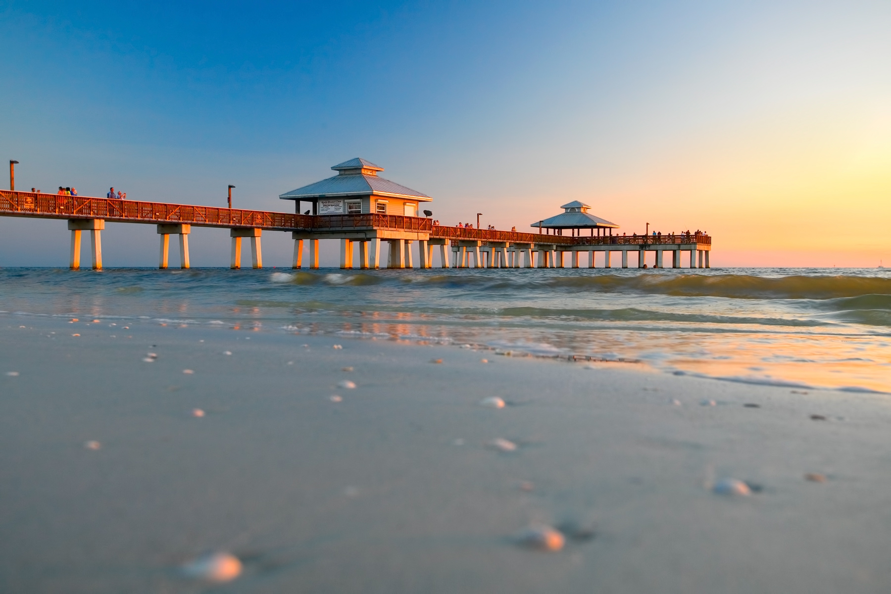 view of Fort Myers beach pier at sunset