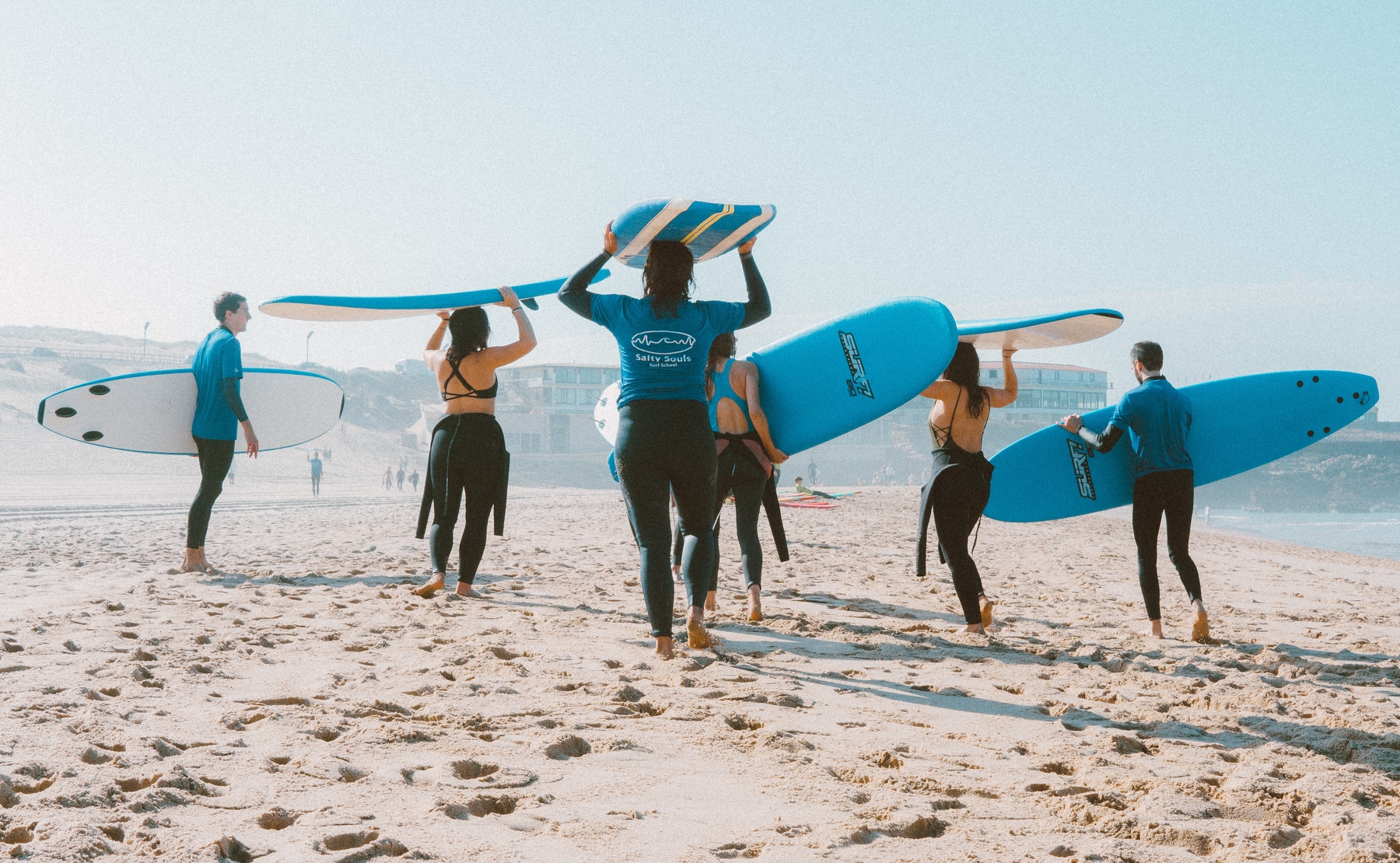 crowd heading off to surf
