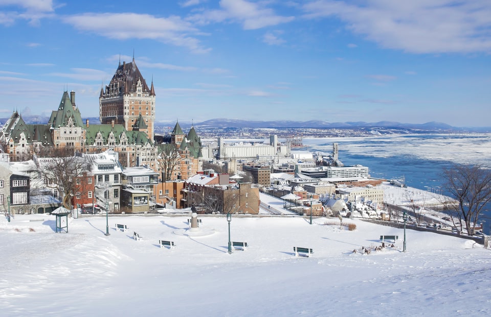 View of Chateau Frontenac and Vieux Quebec in Quebec City on a sunny, snowy day