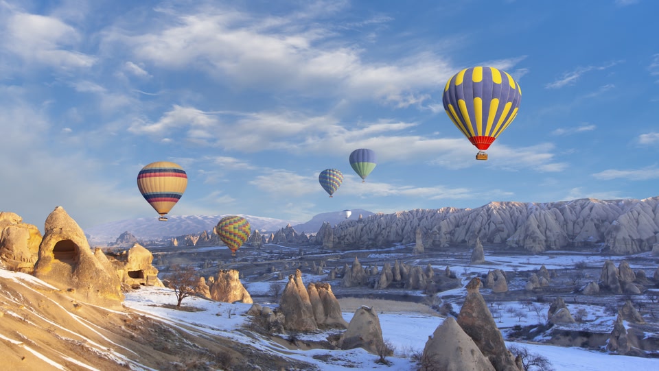 Hot air balloons over Cappadocia's unique landscape
