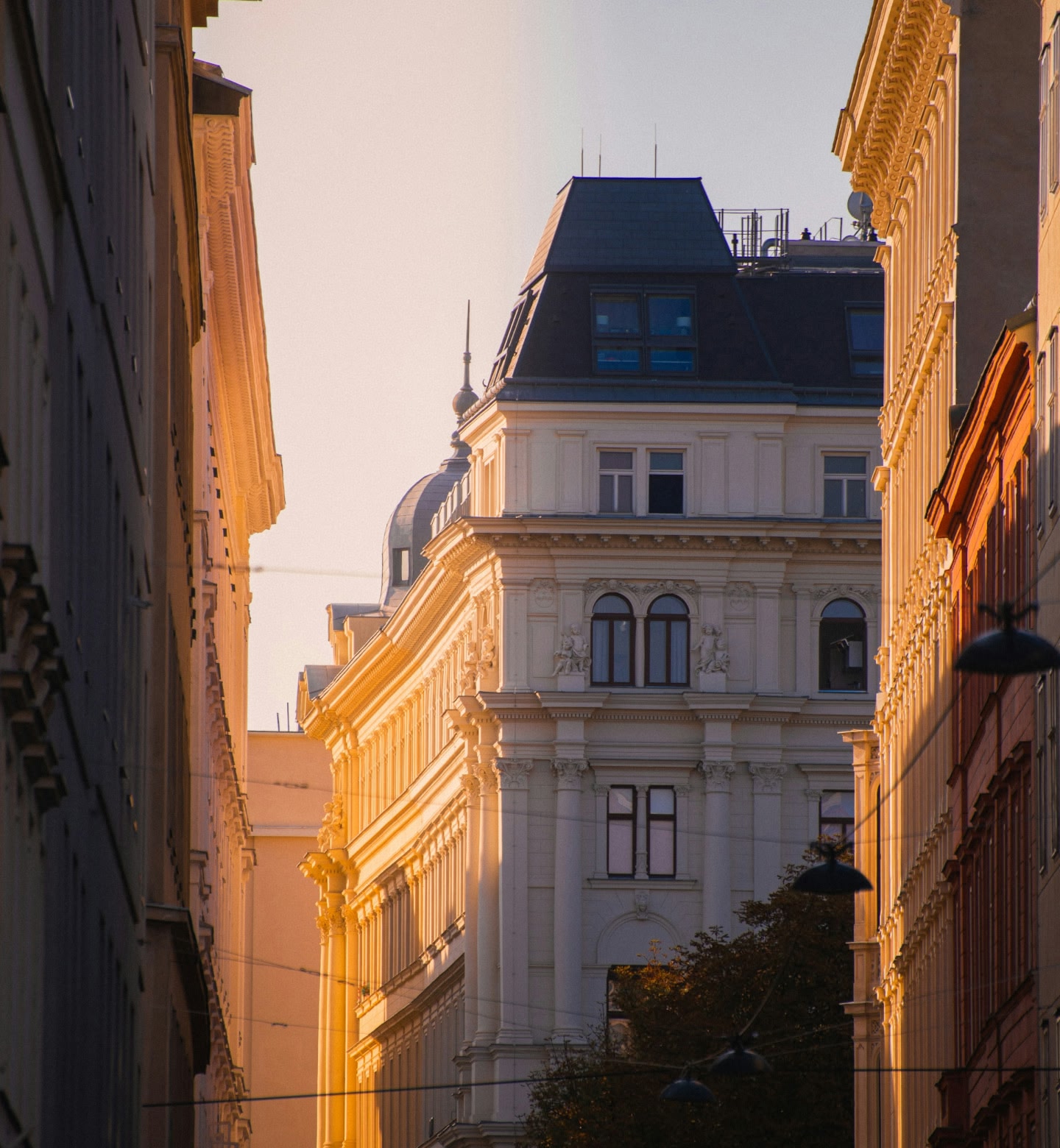 Golden sunlight shines on buildings in Vienna Austria