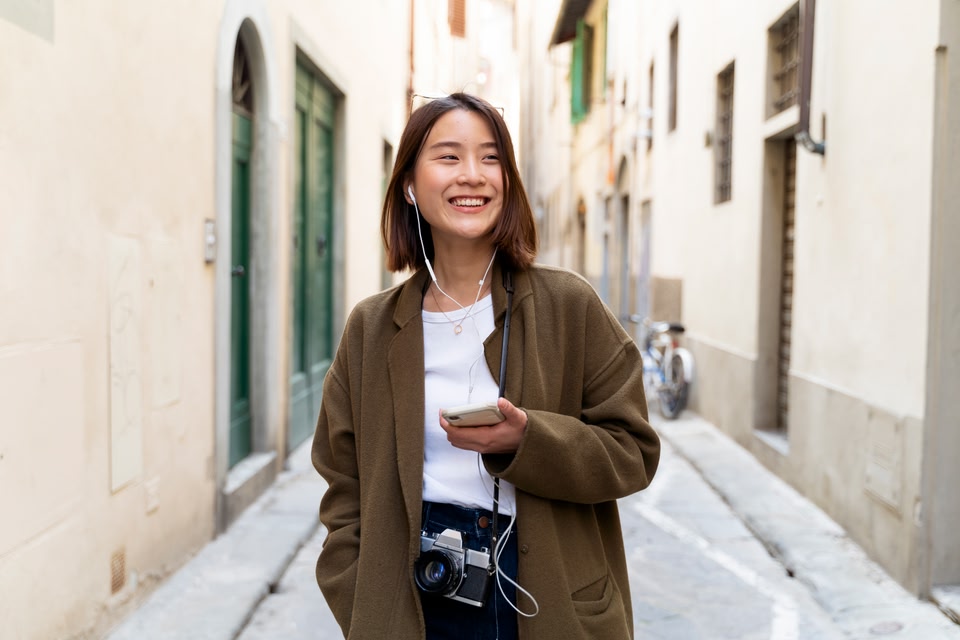 person using an app while overseas