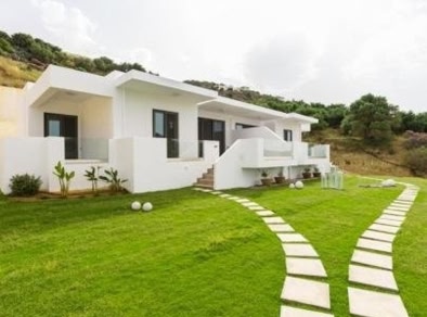 An image of a luxury apartment with green space