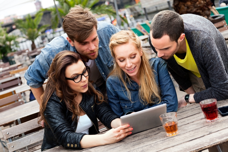 Friends using computer together