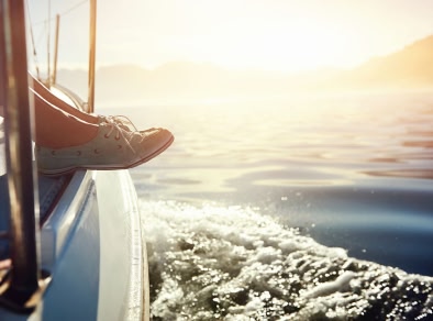 An image showing the view from a boat tour in Santorini