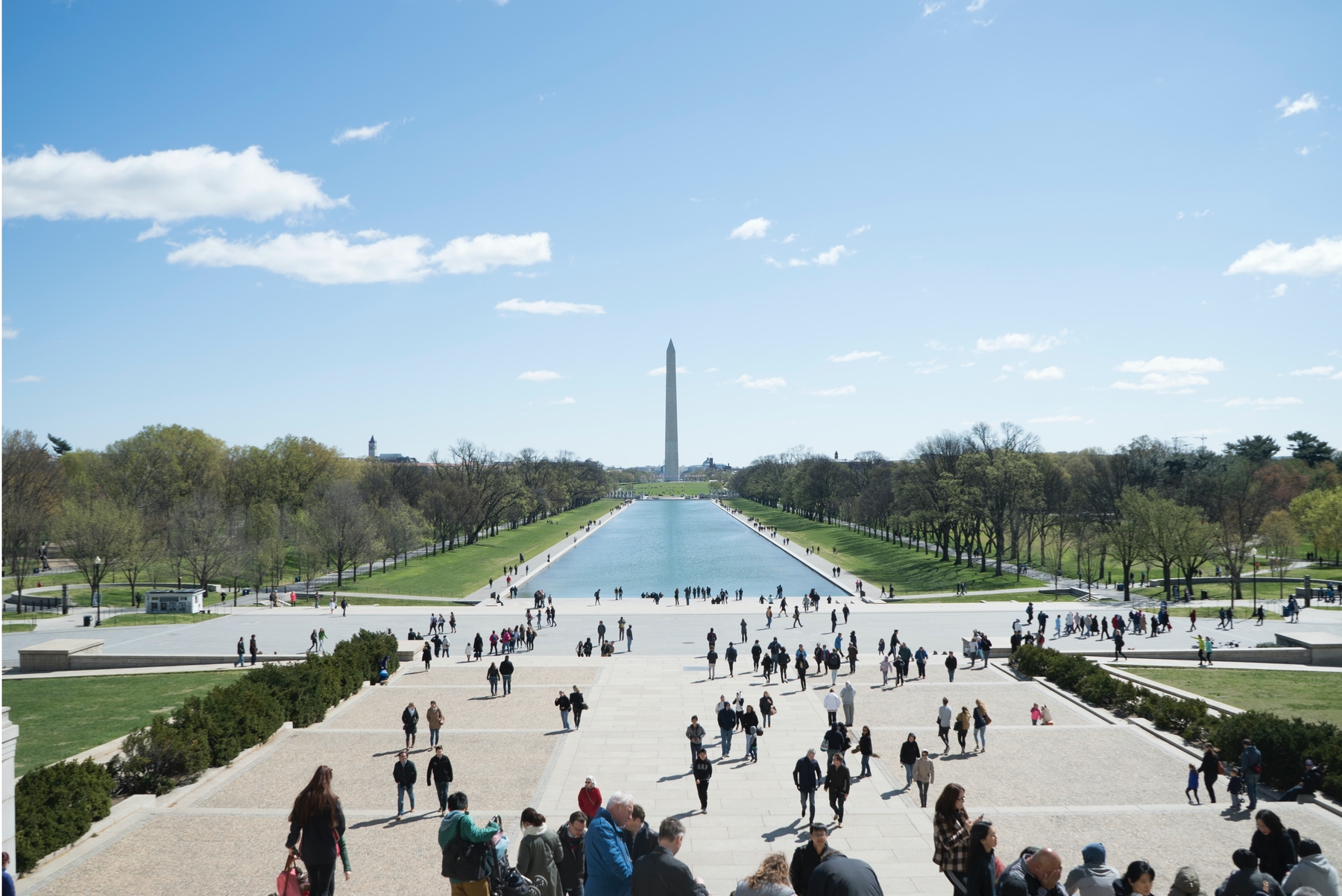 View from the Washington Monument. Sunny day with lots of tourists in Washington, DC.