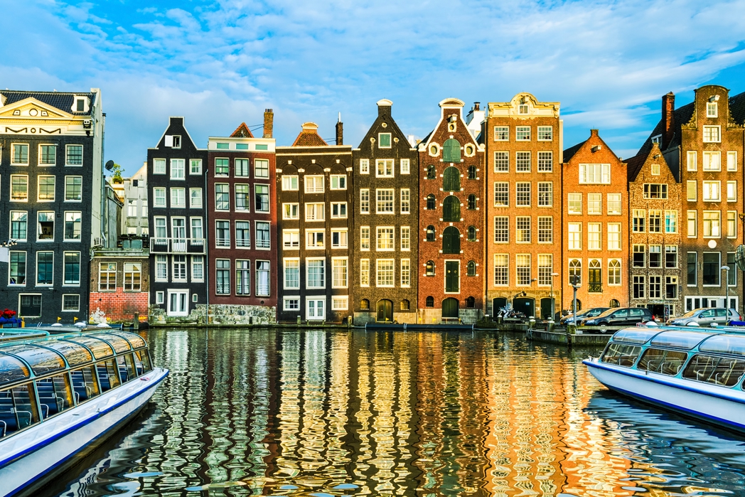 A canal cruise is a must on a summer holiday to Amsterdam