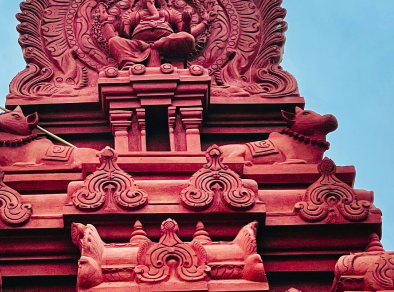 detail of a red temple in India during daytime