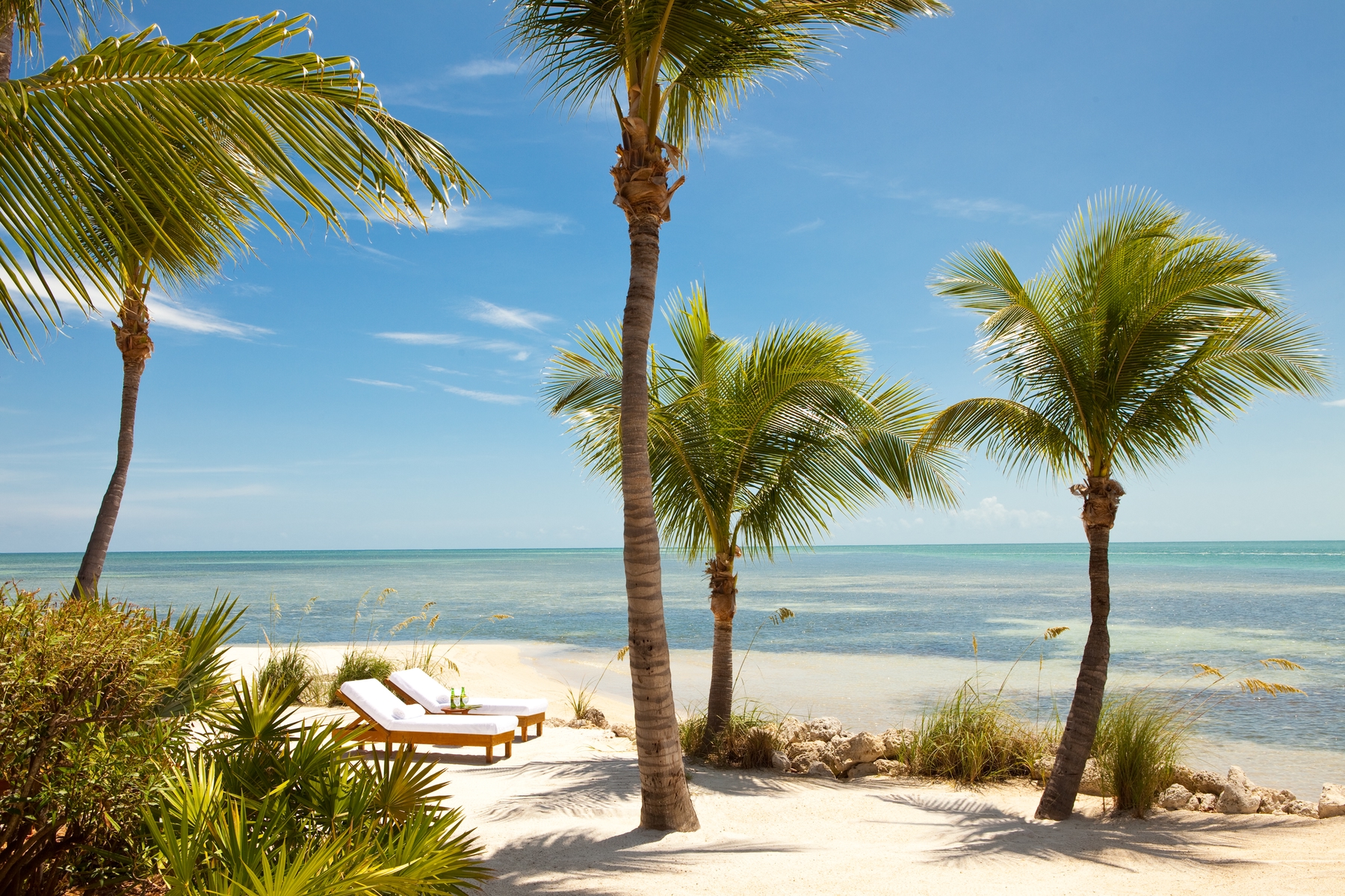 Beachside loungers at the Little Palm Island Resort & Spa