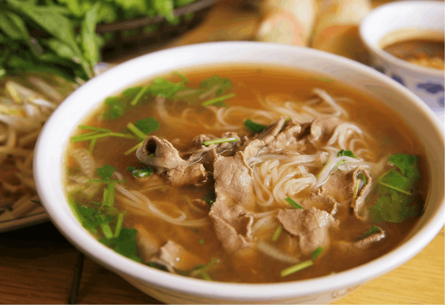 A steaming bowl of meat Pho