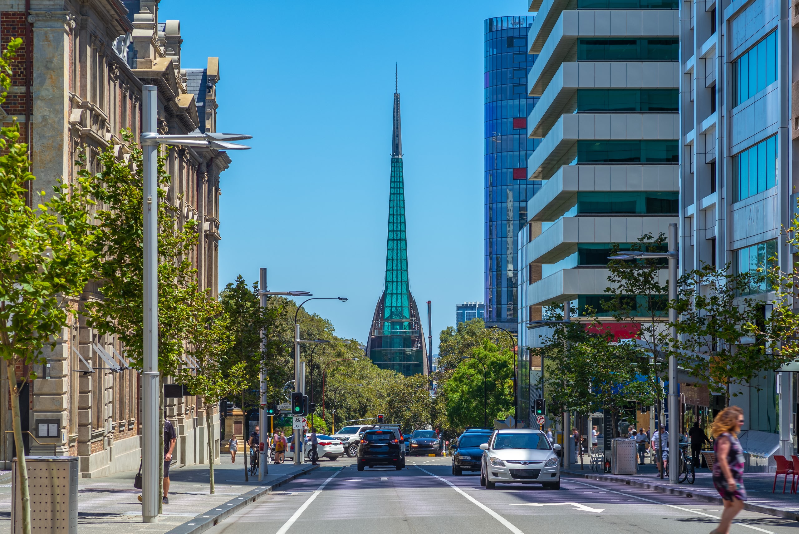 Street view of Perth with swan bell tower in the background. 