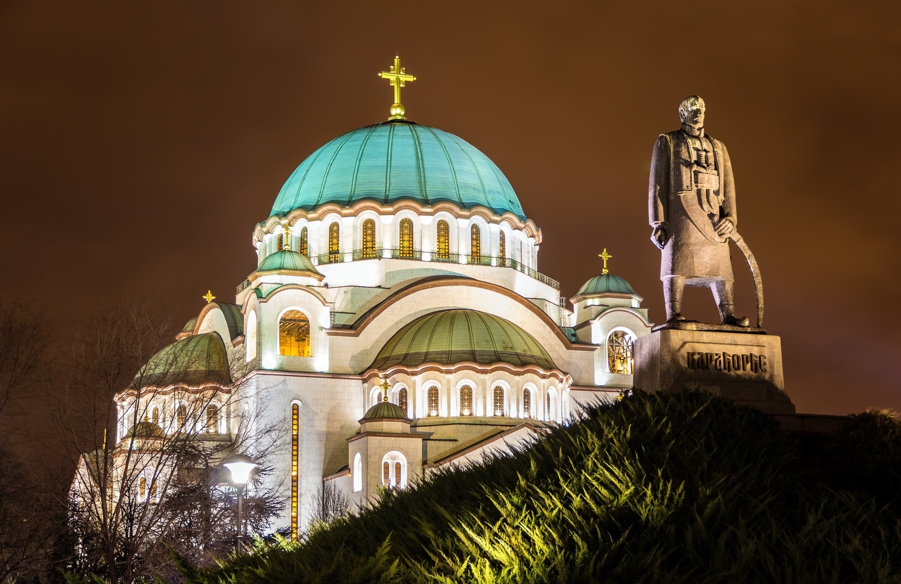 View of statue and Saint Sava Cathedral at night, the oldest orthodox church in the world located in Belgrade