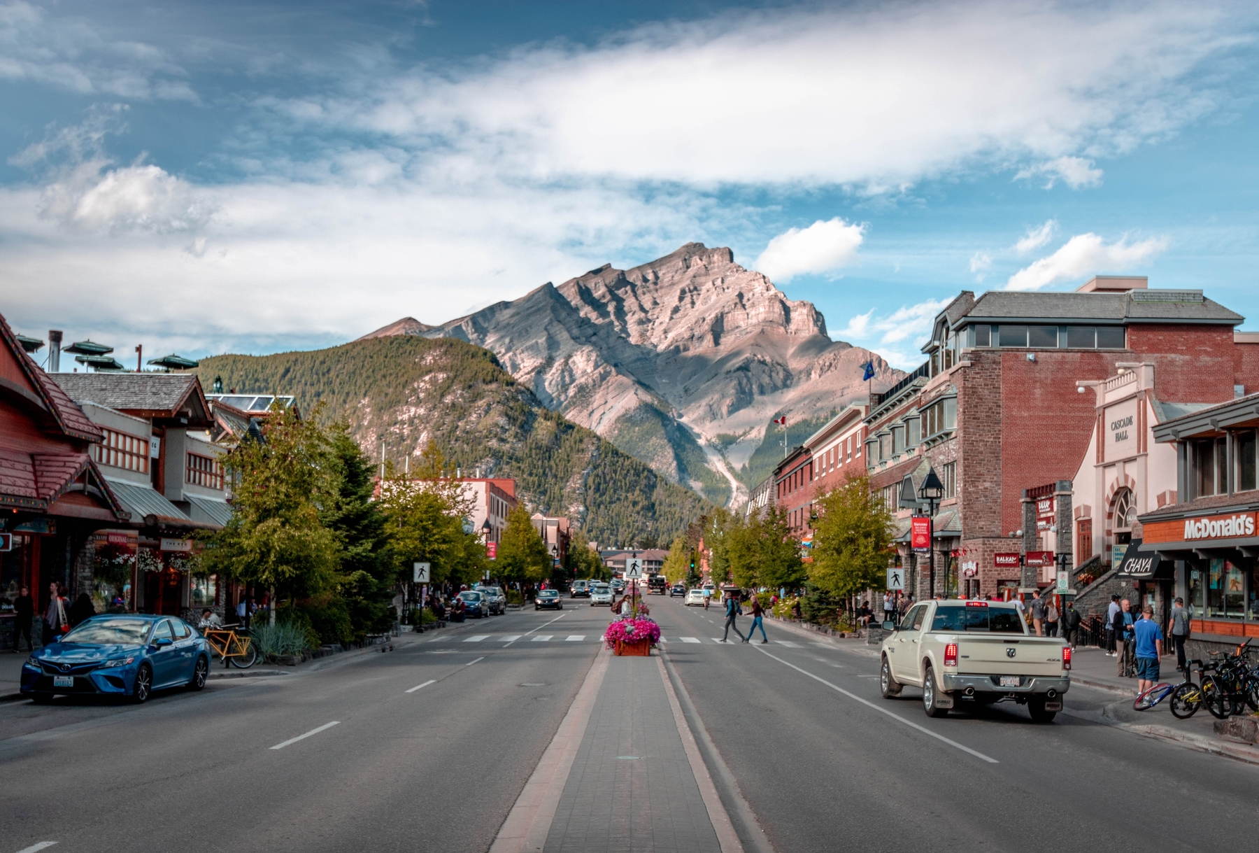 main street in Banff, Canada. Rocky Mountains in the distance.