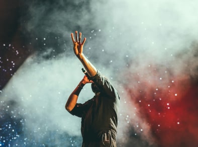 An artist performing on stage 