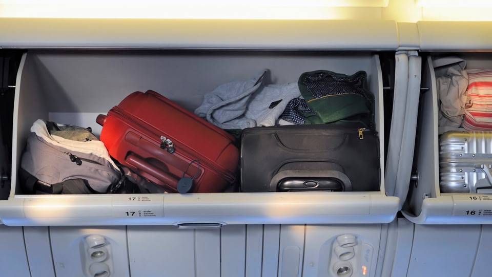 an airplane overhead compartment
