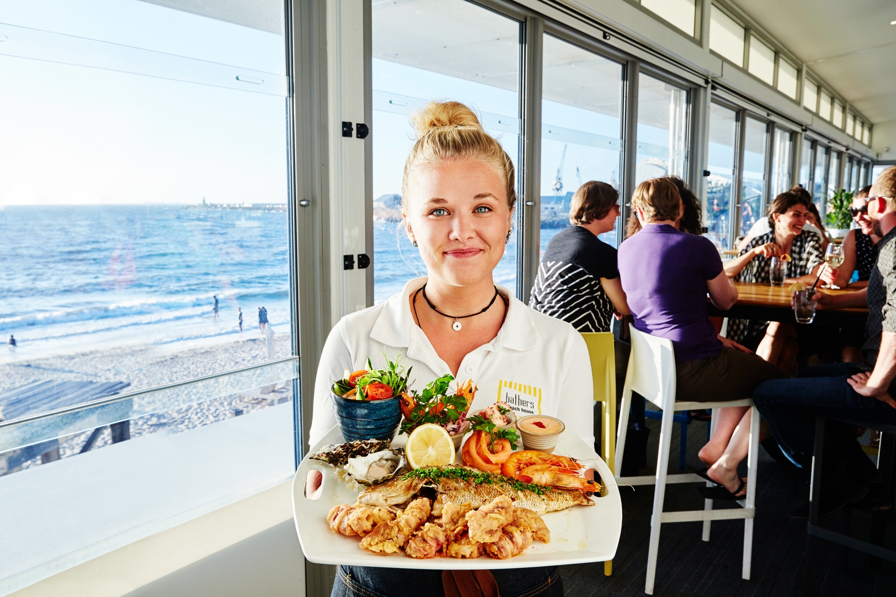 lady holding plate of food