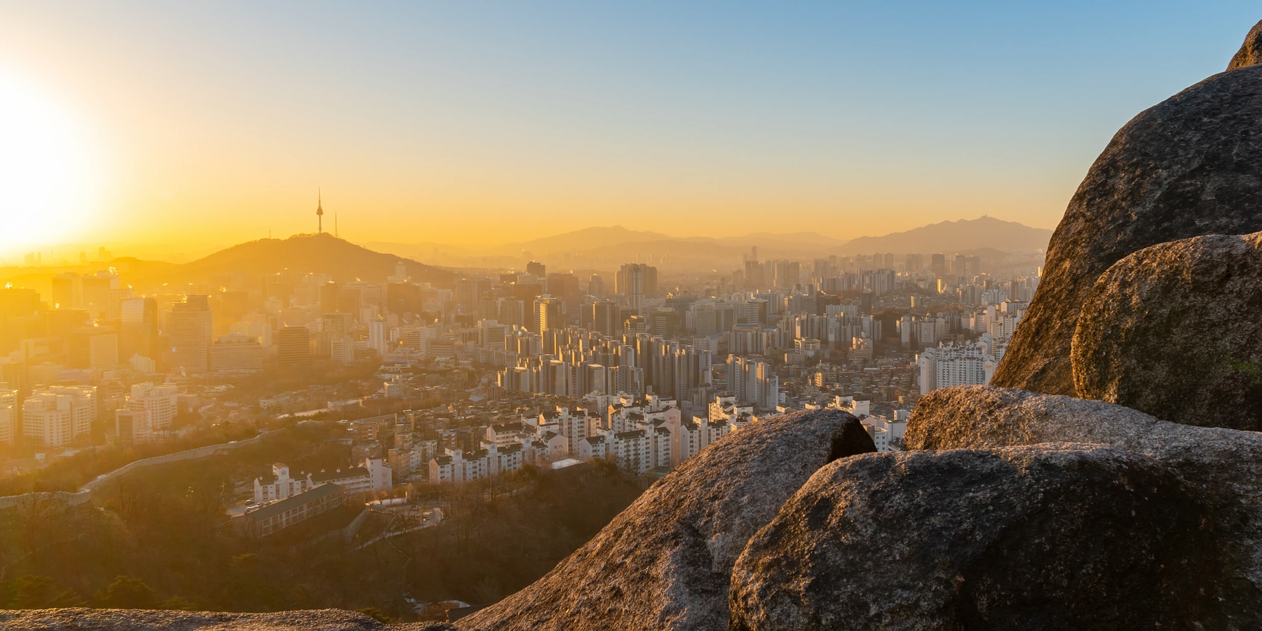 Sunset city view from a mountain