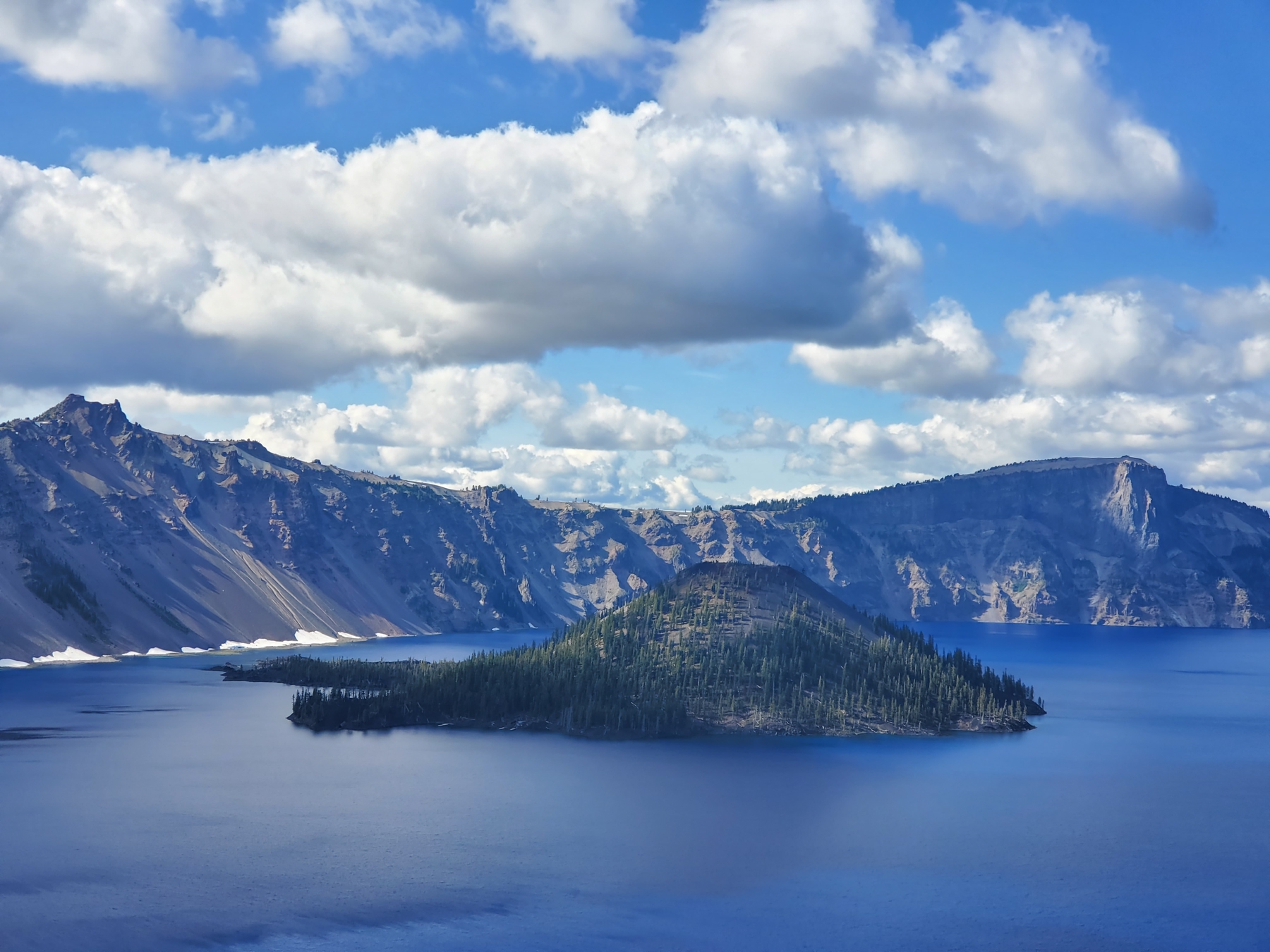 An island inside a blue lake in the Northwest USA