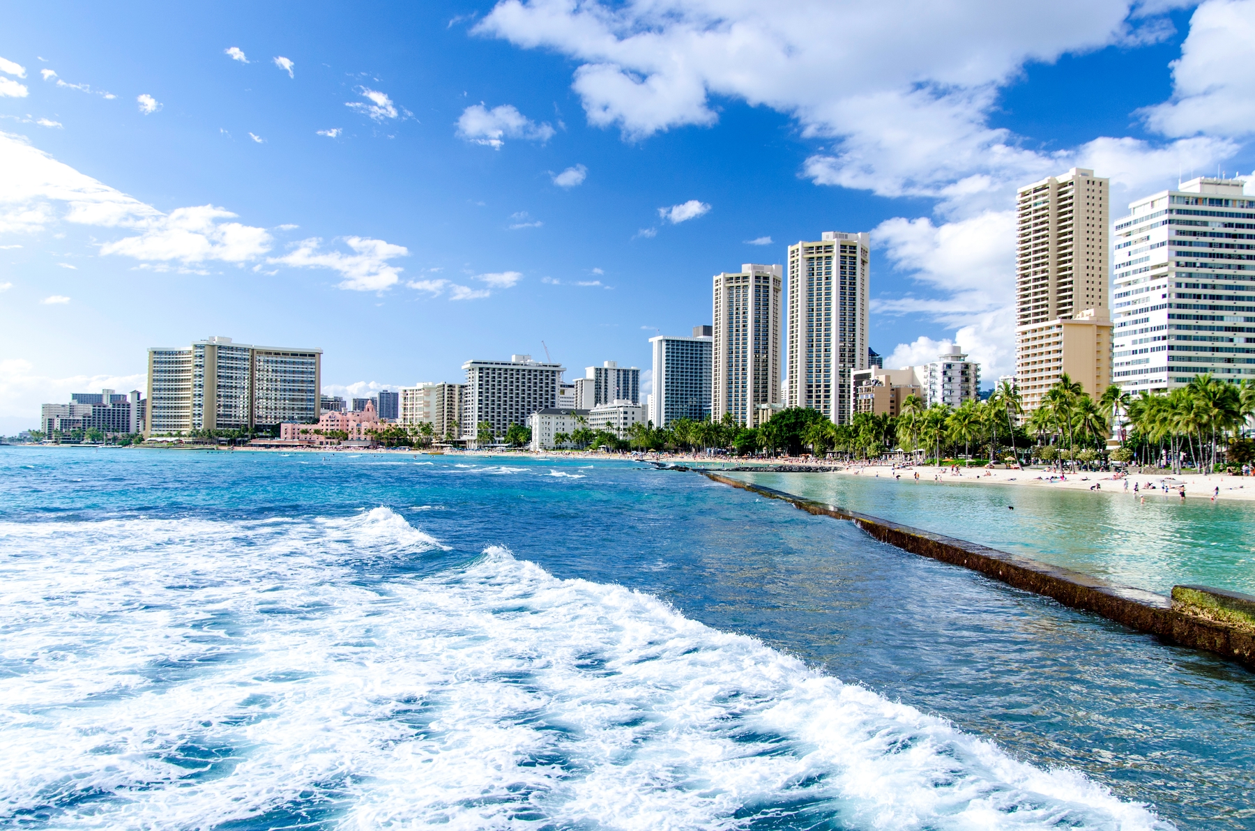 When thinking of where to go for Memorial Day weekend, this beach and ocean in front of the Honolulu skyline seem perfect!