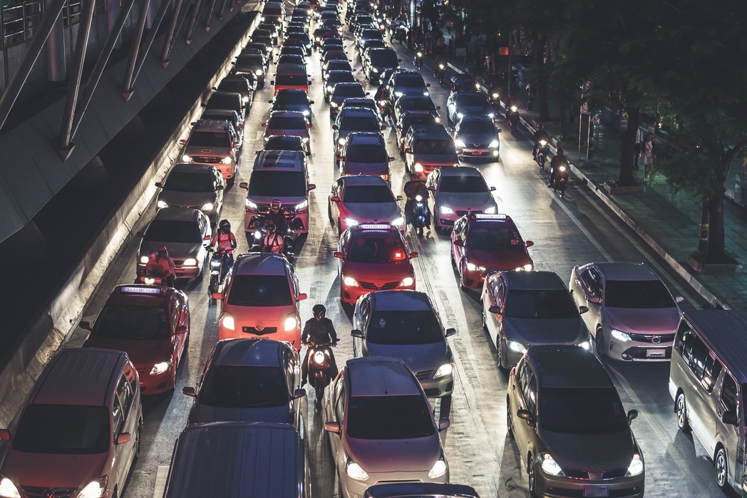 Rush Hour With Cars And Generic Vehicles Traffic Jam In Bangkok At Night. 
