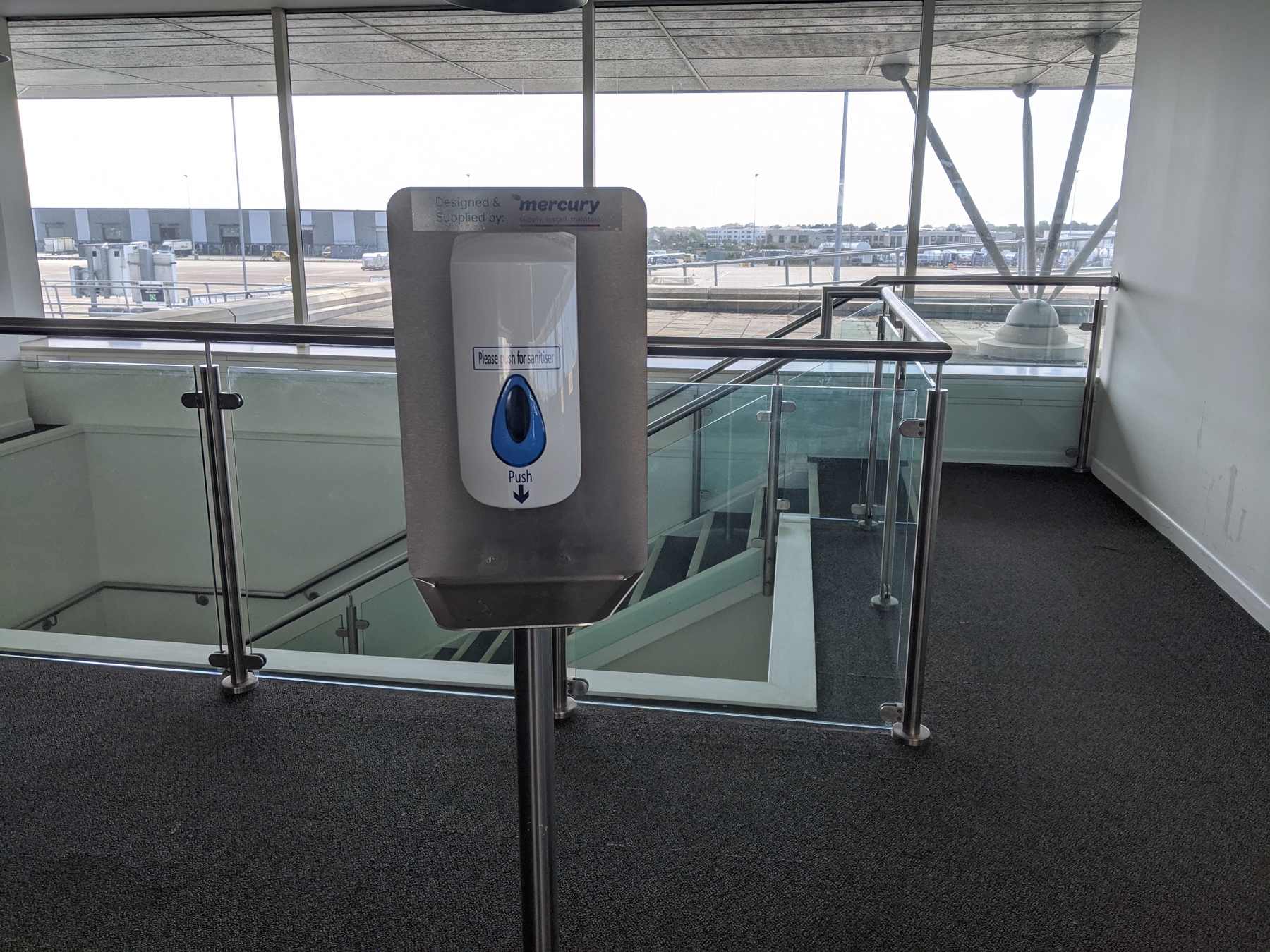 Hand sanitizer station at the airport
