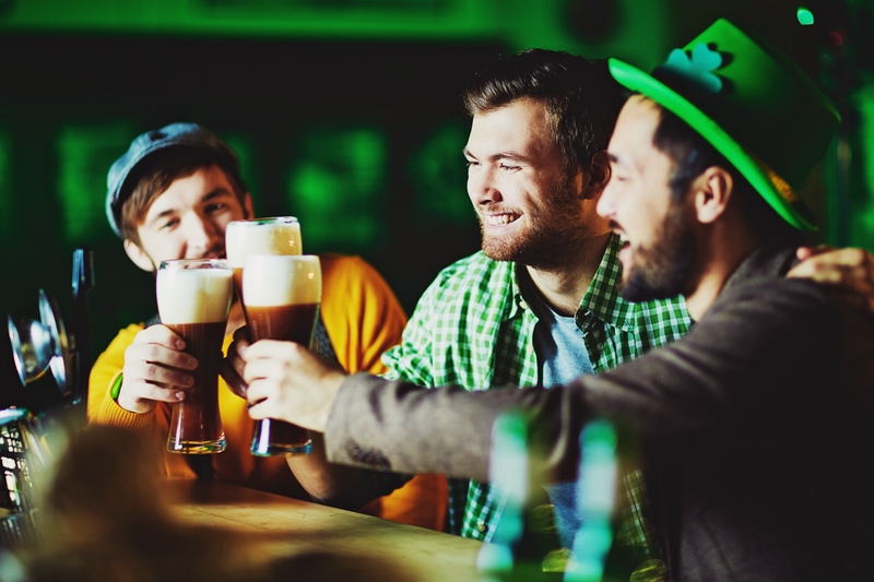 people drinking beer in a pub