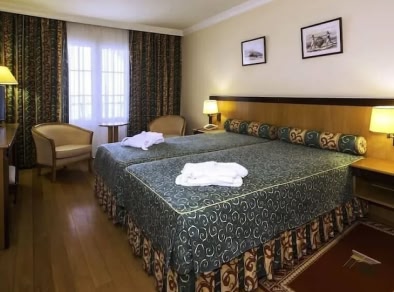 immagine della camera d'albergo Quinta Bela Sao Tiago con un letto