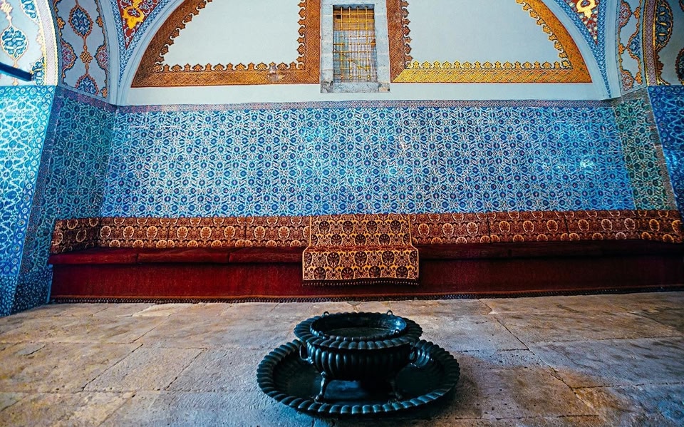 Interior of a mosque in Istanbul with intricate blue tiles