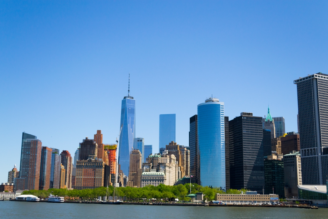 view of the manhattan skyline and the One World Observatory in the background from the Staten Island Ferry