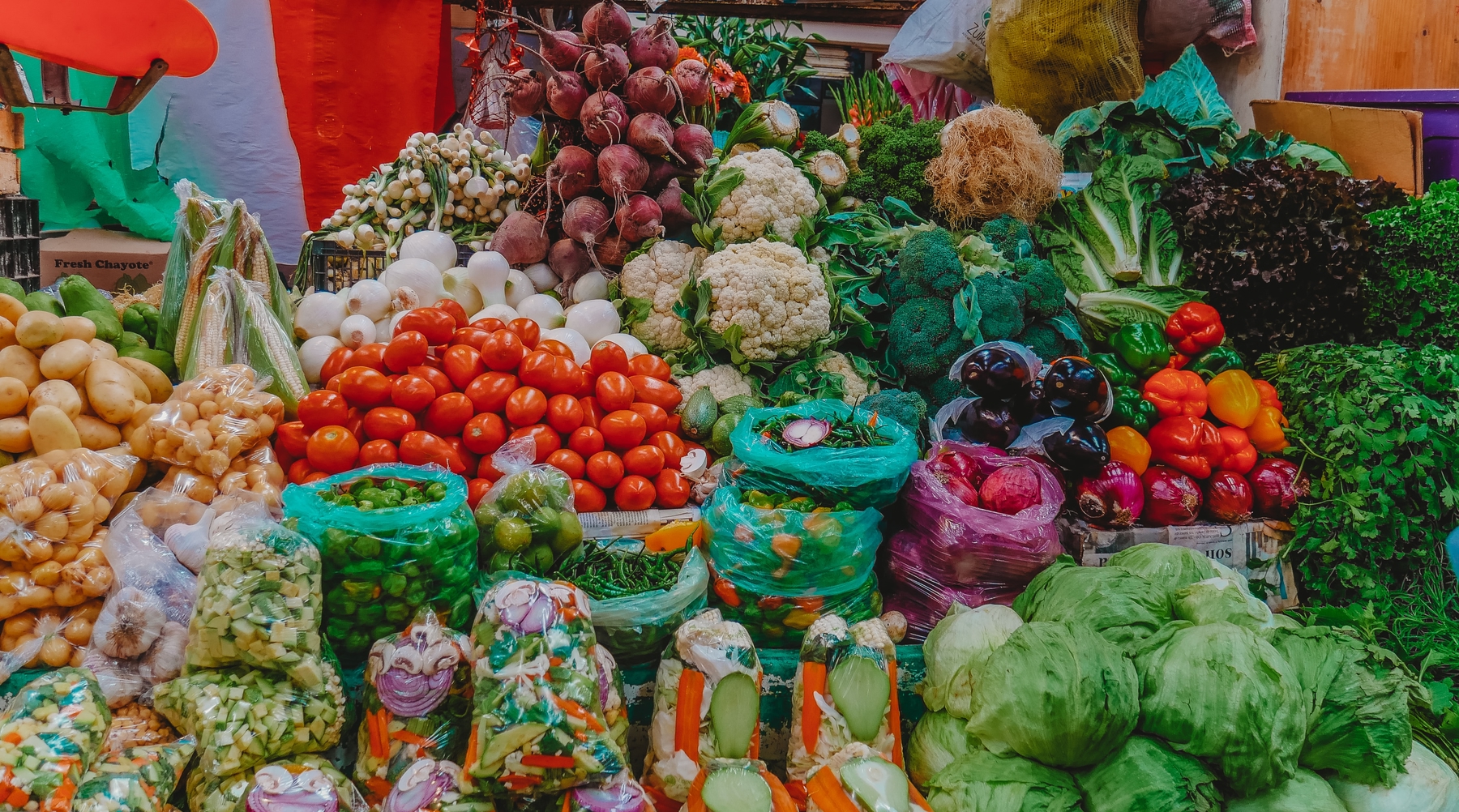 vegetables at the market in Mexico. make markets a part of your daily routine when you travel and work remotely.