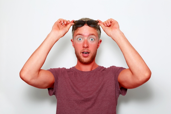 Man gets sun burn - 10 most common holiday arguments couples have